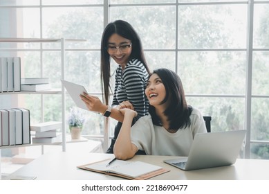 Happy Asian Lesbian Couple Working Together In Office. LGBT Community, Lesbian, Homosexual, Business Concept