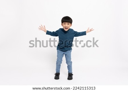 Happy Asian little boy open arms from happiness isolated on white background, Excited kid winner success concept, Looking at camera and full body composition