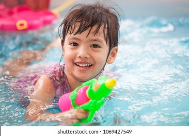 kid with water gun