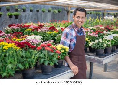 Happy Asian Male Florist Working Flower Gardening Shop