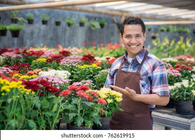 Happy Asian Male Florist Working Flower Gardening Shop