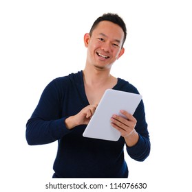 Happy Asian Male On A Generic Tablet