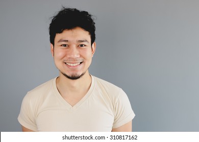 Happy Asian Man Close Up Portrait.