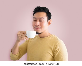 Happy Asian Man Feels Refresh By Drink And Smell A Cup Of Coffee.