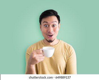 Happy Asian Man Feels Refresh By Drink And Smell A Cup Of Coffee.