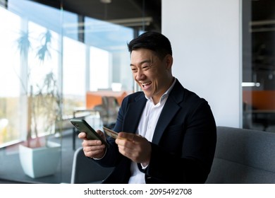 Happy Asian Man Shopping Online, Businessman In Office, Shopping In Online Store Using Credit Card, Happy With The Loan