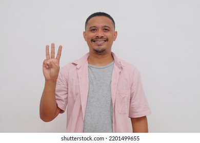 Happy Asian Man Showing Three Fingers