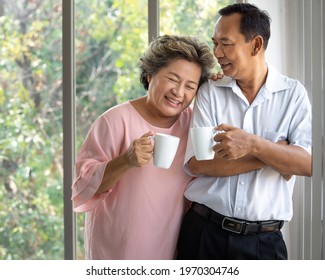 Happy Asian Older Couple Enjoying Drink Morning Coffee At Home. Daily Life Retired Elder Married People With Freedom On Finance. Happy Relationship Grandparent Retirement Plan Senior Person Lifestyle.