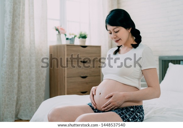 Happy Asian Pregnant Woman Braid Touching People Interiors