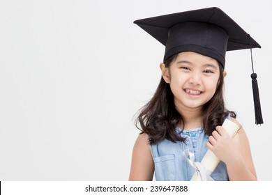 Happy Asian School Kid Graduate In Graduation Cap