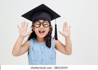 Happy Asian School Kid Graduate In Graduation Cap