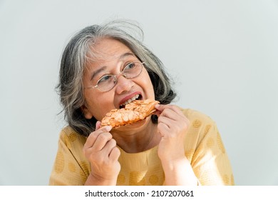 Happy Asian Senior Women Enjoying Eating Pie