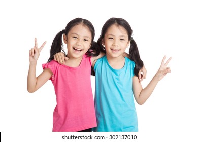 Happy Asian Twins Girls  Smile Show Victory Sign  Isolated On White Background