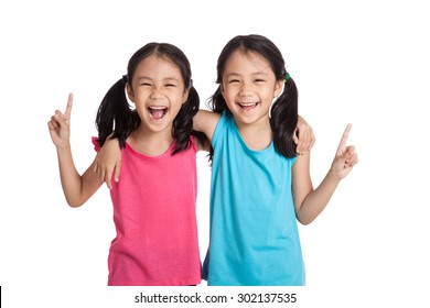 Happy Asian Twins Girls  Smile Point Up  Isolated On White Background