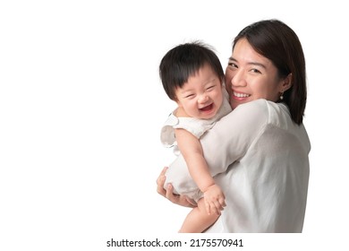 Happy Asian Woman Holding Little Asian Girl With Smile, Mother And Daughter Laughing, Isolate On White Background, With Clipping Path.