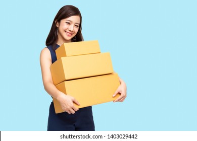 Happy Asian Woman Holding Package Parcel Box, Delivery Courier And Shipment Service Concept