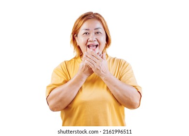 Happy Asian Woman Laughing On White Background. Old Women's Enjoyment.