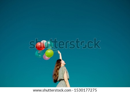 Similar – Young teenage girl blowing pink bubble gum