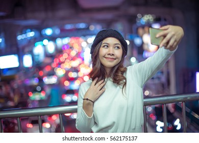 Happy Asian Woman Taking Selfie Joyful And Happy Smiling At Night