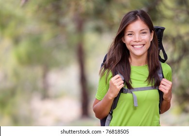 Happy Asian Young Woman Hiker Hiking Portrait With Backpack. Fresh And Healthy Lifestyle. Hike Outdoors In Forest. Beautiful Mixed Race Caucasian / Chinese Girl.