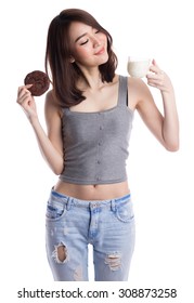 Happy Asian Young Woman With Milk And Chocolate Chip Cookies