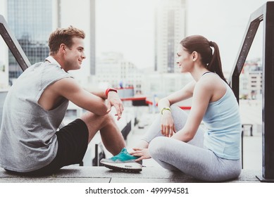 Happy athletic couple spending time together after workout.