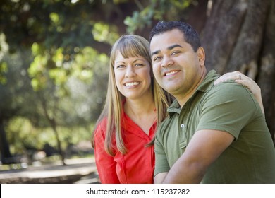 Happy Attractive Mixed Race Couple Portrait at the Park