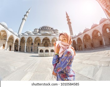 Happy Attractive Muslim Woman In Istanbul, Turkey, Posing In Courtyard Of Suleymaniye Mosque, Religion And Travel Concept.