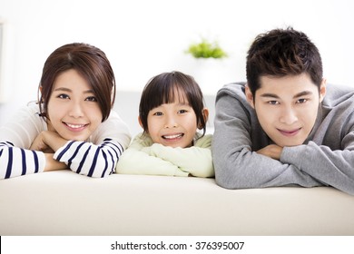 Happy Attractive Young Family and little girl