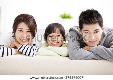 Happy Attractive Young  Family and little girl