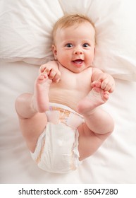 Happy Baby In The Bed