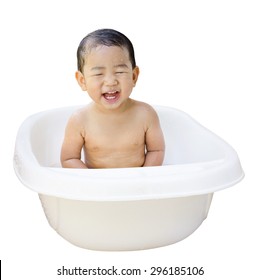 Happy Baby Boy Is Bathed In White Bath