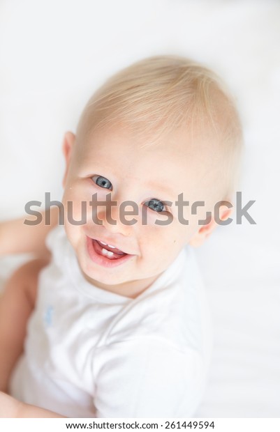 Happy Baby Boy Blond Hair Blue Stock Photo Edit Now 261449594