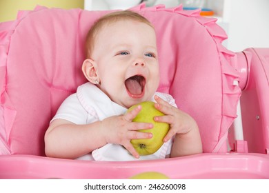 Happy Baby Eating Apple