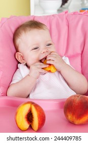 Happy Baby Eating Fruit