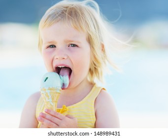 Happy Baby Eating Ice Cream