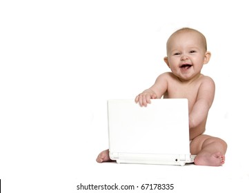 Happy Baby Laughing and Playing with Mini Laptop