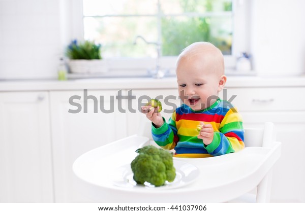 Happy Baby Sitting High Chair Eating Stock Photo Edit Now 441037906