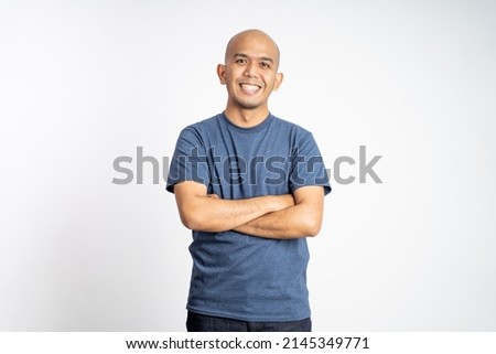 Similar – Image, Stock Photo Portrait of confident bald young woman wearing bright orange jacket in studio