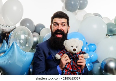 Happy Bearded Businessman In Suit With Teddy Bear. Festive Event. Handsome Man Celebrate Birthday.