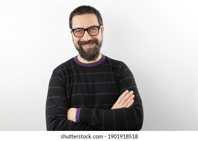 Happy Bearded Man Smiling Wearing Casual Clothes And Glasses, Folded Arms On Isolated White Background