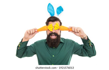 Happy Bearded Man Wear Bunny Ears. Happy Easter Menu. Easter Carrot. Hipster Wearing Rabbit Ears. Time For Fun. Cheerful Guy Holding Carrots. Spring Holiday Greeting. Eastertide.