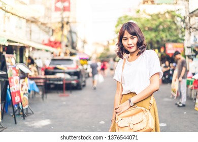 Happy and Beautiful Asian woman traveling at Khao Sarn Road in Thailand - Shutterstock ID 1376544071
