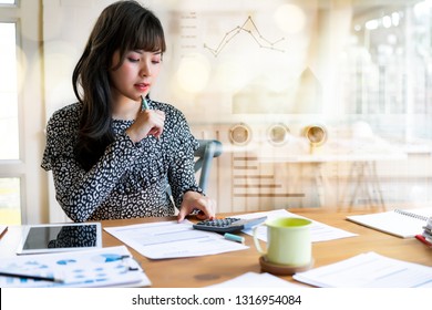 Happy Beautiful Asian Woman Working About Financial With Business Report And Calculator.financial Or Accounting Concept.