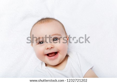 Similar – Portrait of 3 month old baby smiling.