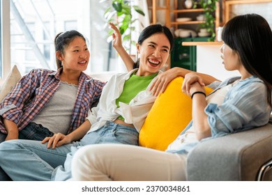 Happy beautiful chinese women friends bonding at home - Playful pretty asian female adults meeting and having fun at home, concepts about lifestyle, domestic life and friendship - Powered by Shutterstock