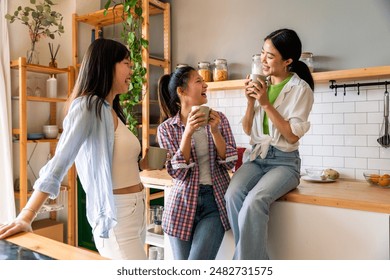 Happy beautiful chinese women friends bonding at home - Playful pretty asian female adults meeting and having fun at home, concepts about lifestyle, domestic life and friendship - Powered by Shutterstock