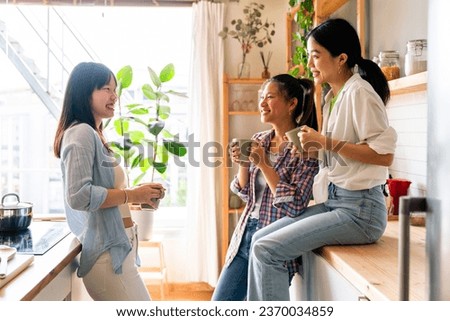 Happy beautiful chinese women friends bonding at home - Playful pretty asian female adults meeting and having fun at home, concepts about lifestyle, domestic life and friendship