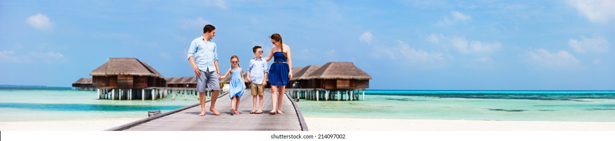 Happy Beautiful Family During Summer Vacation At Luxury Resort Wide Panorama With Copy Space, Perfect For Banners