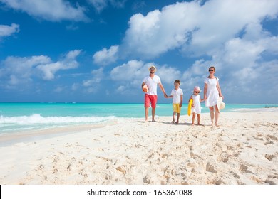 Happy beautiful family on a Caribbean holiday vacation